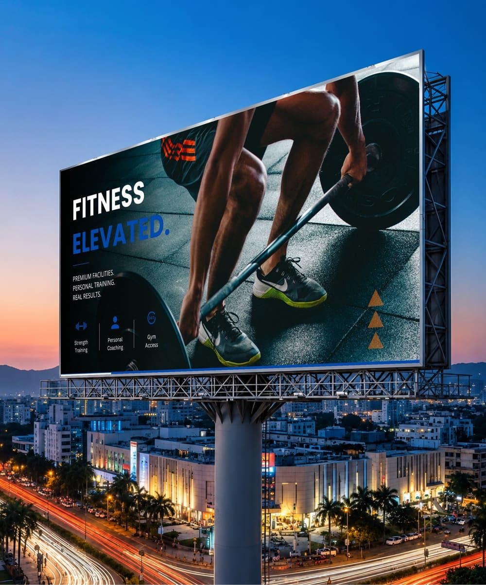 Media Mart highway billboard at night